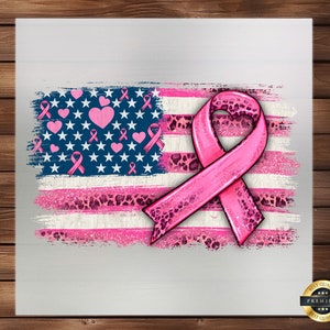 May include: Pink ribbon with a leopard print design on a distressed American flag background. The ribbon is a symbol of breast cancer awareness.
