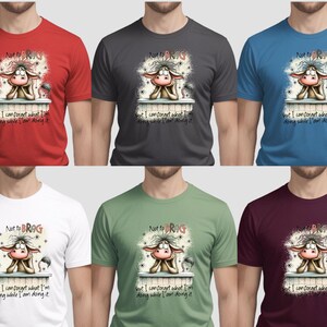 May include: A collection of six t-shirts in various colors: red, charcoal, blue, white, green, and burgundy. Each shirt features a cartoon cow graphic with the text "Not to BRAG" and "but I can forget what I'm doing while I am doing it."