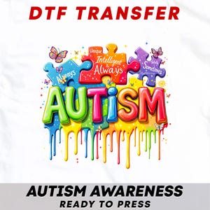 May include: A set of three ceramic mugs with a speckled, matte finish. The mugs are in shades of cream, light gray, and dark gray. Each mug has a simple, minimalist design and a rounded handle. The mugs are likely for coffee or tea.