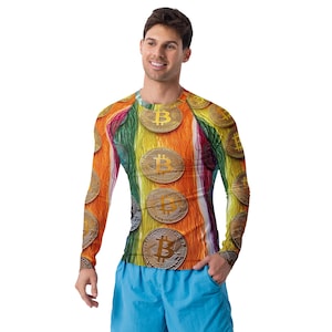 May include: A long-sleeved shirt with a colorful striped pattern and a repeated image of gold Bitcoin coins.