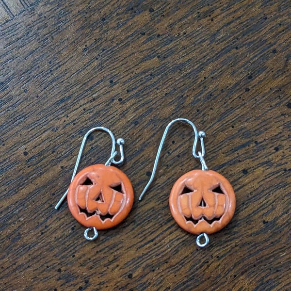 Ceramic pumpkin bead earrings. 1.3/4"