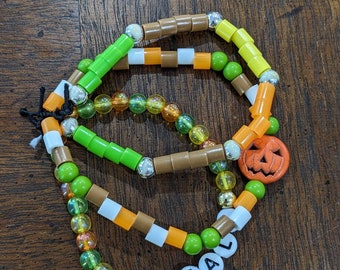 Festive three strand autumn bracelet with pumpkin