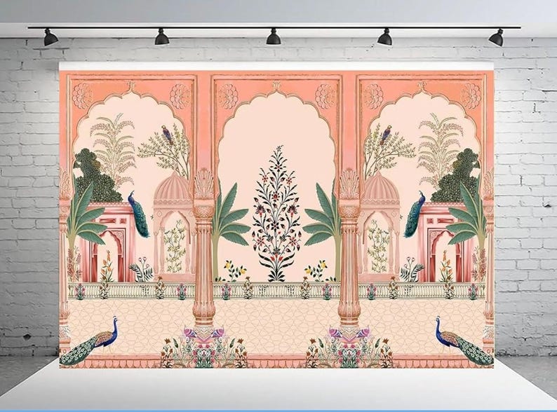 May include: A large rectangular backdrop featuring a peach-colored architectural scene with arched alcoves, ornate pillars, and a repeating pattern of peacocks, palm trees, and floral motifs. The design includes symmetrical elements and detailed botanical illustrations.
