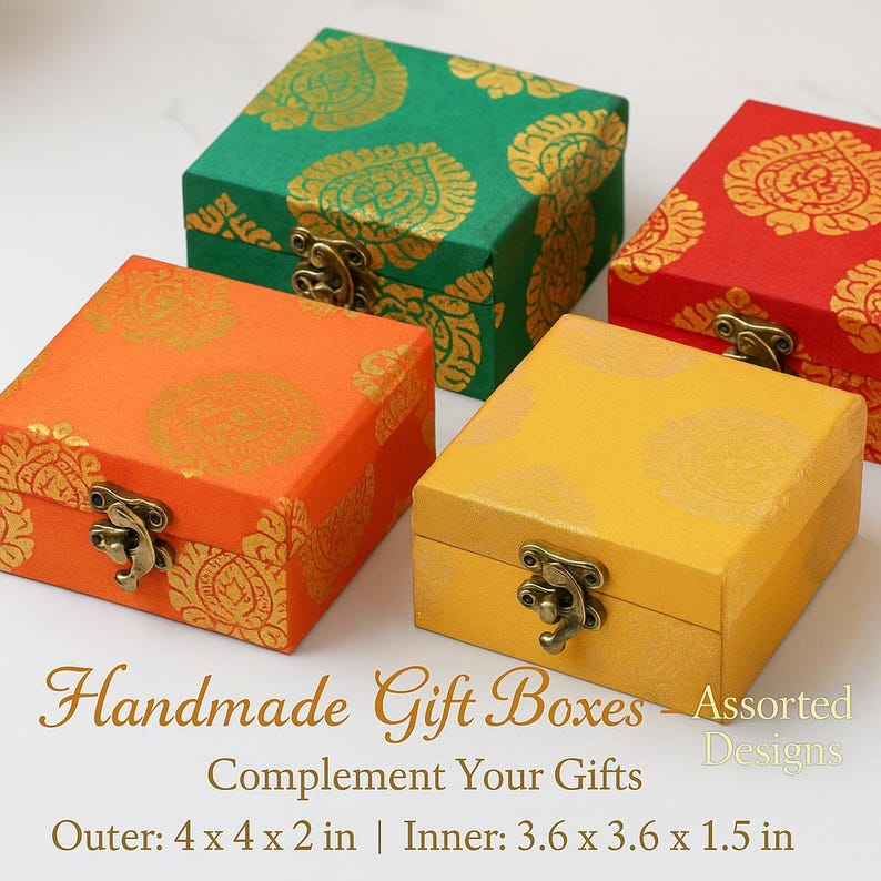 May include: Four square handmade gift boxes in orange, green, yellow, and red. Each box has a gold floral pattern and a metal clasp. The outer dimensions are 4 x 4 x 2 inches.