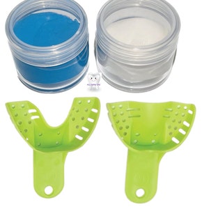 May include: Two clear plastic containers with blue and white dental impression material, and two green plastic impression trays.  ALL Dental INC.