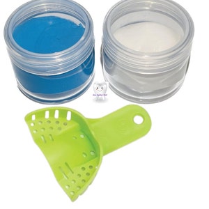 May include: Two clear plastic containers with lids, one filled with blue putty and the other with white putty. A green plastic impression tray is also included.