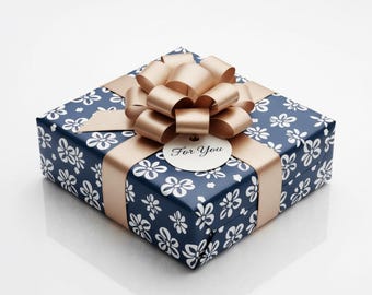 May include: A wrapped gift box with a navy blue floral pattern and a gold ribbon and bow. A small, round tag with the words "For You" is attached to the bow. The gift box is on a white background.