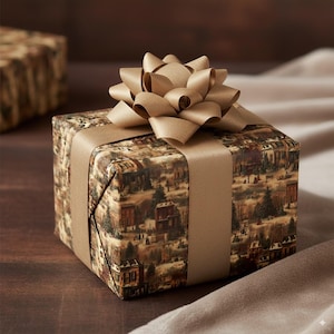 May include: A wrapped gift box with a gold bow. The box is wrapped in paper with a vintage town scene print. A gold ribbon encircles the box. The bow is large and multi-layered, adding a decorative touch to the present.