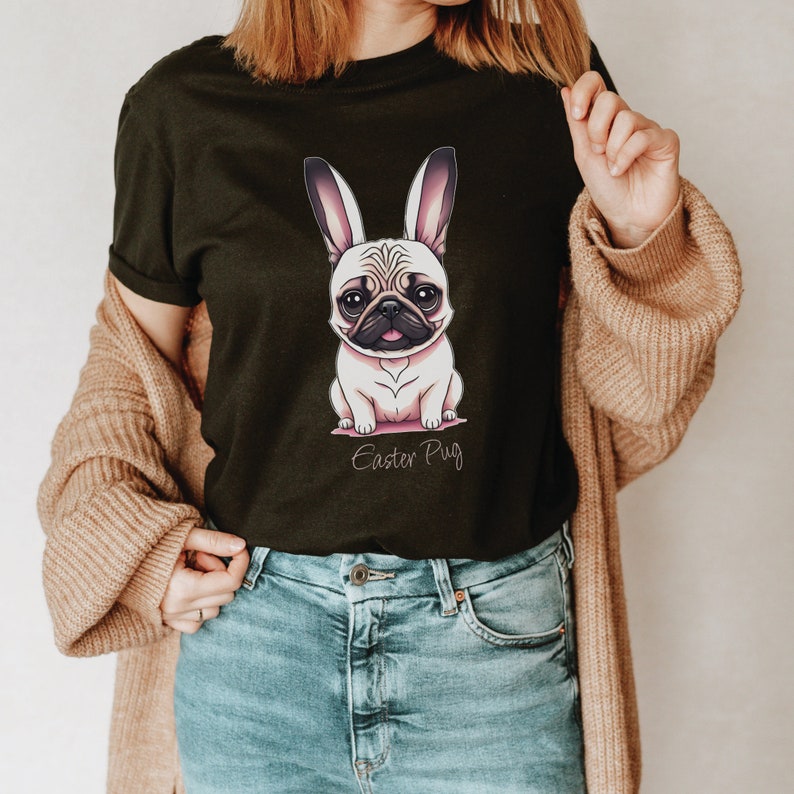 May include: A black t-shirt featuring a cartoon pug wearing bunny ears. The text "Easter Pug" is printed below the image.
