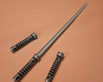 May include: Three silver and black lightsaber handles with a silver lightsaber blade. The handles have black and silver stripes and decorative markings.