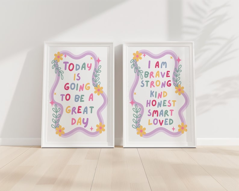 May include: Two framed art prints with inspirational quotes. The left print reads "TODAY IS GOING TO BE A GREAT DAY" in colorful text. The right print says "I AM BRAVE STRONG KIND HONEST SMART LOVED". Both have floral and star accents.