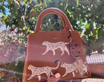 Unique handbag with handmade painting.