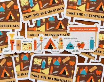 May include: A collection of colorful stickers with illustrations of camping essentials, such as a tent, first aid kit, water bottle, and a compass. The stickers have the text "Take the 10 Essentials" on them.