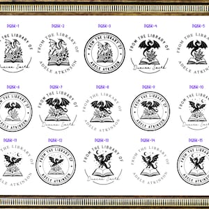 May include: A collection of fifteen black and white circular and semi-circular book stamp designs featuring dragons, open books, and floral elements. Each design includes the text From The Library Of followed by the names Duncan Smith or Adele Atkinson.