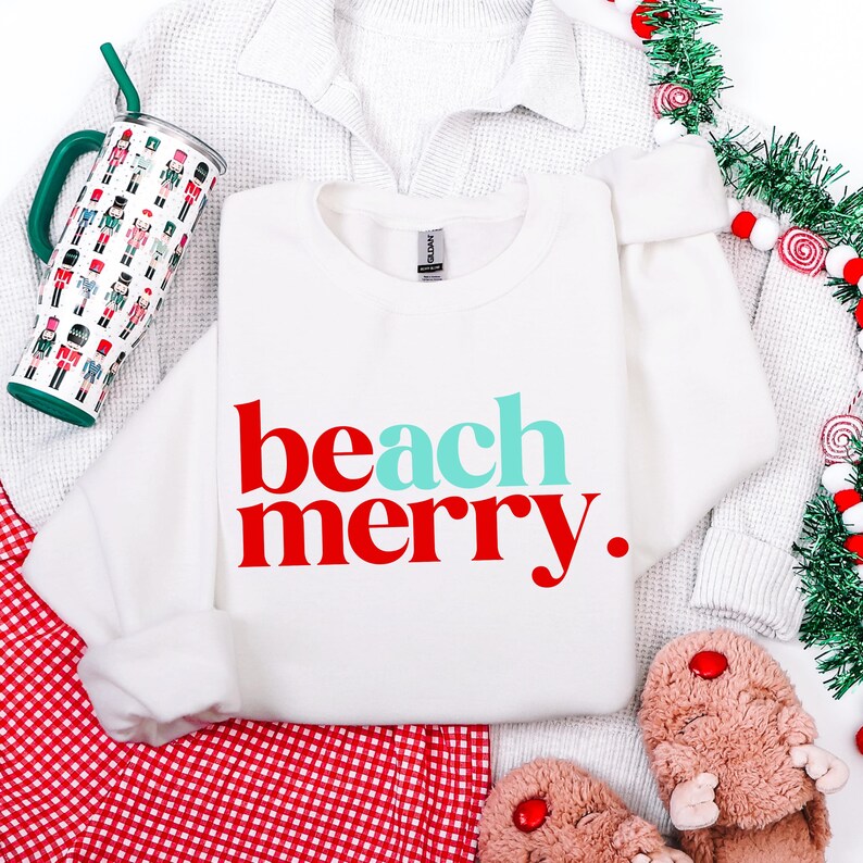 Tropical Vacation Clothing Holiday Beach Apparel Christmas Themed Sweatshirt Coastal Celebration Wear Teal Red Design Details Cotton Material Comfort Warm Weather Christmas Outfit Beach Holiday Gift Casual Festive Style Family Photo Apparel