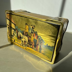Vintage English biscuits tin with a coaching scene