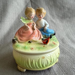 Musical JOSEF ORIGINALS Couple Figurine, Porcelain Boy & Girl Music Box, &quot;Shadow of Your Smile&quot; Song, Boy and Girl Red Bird, Made in Japan