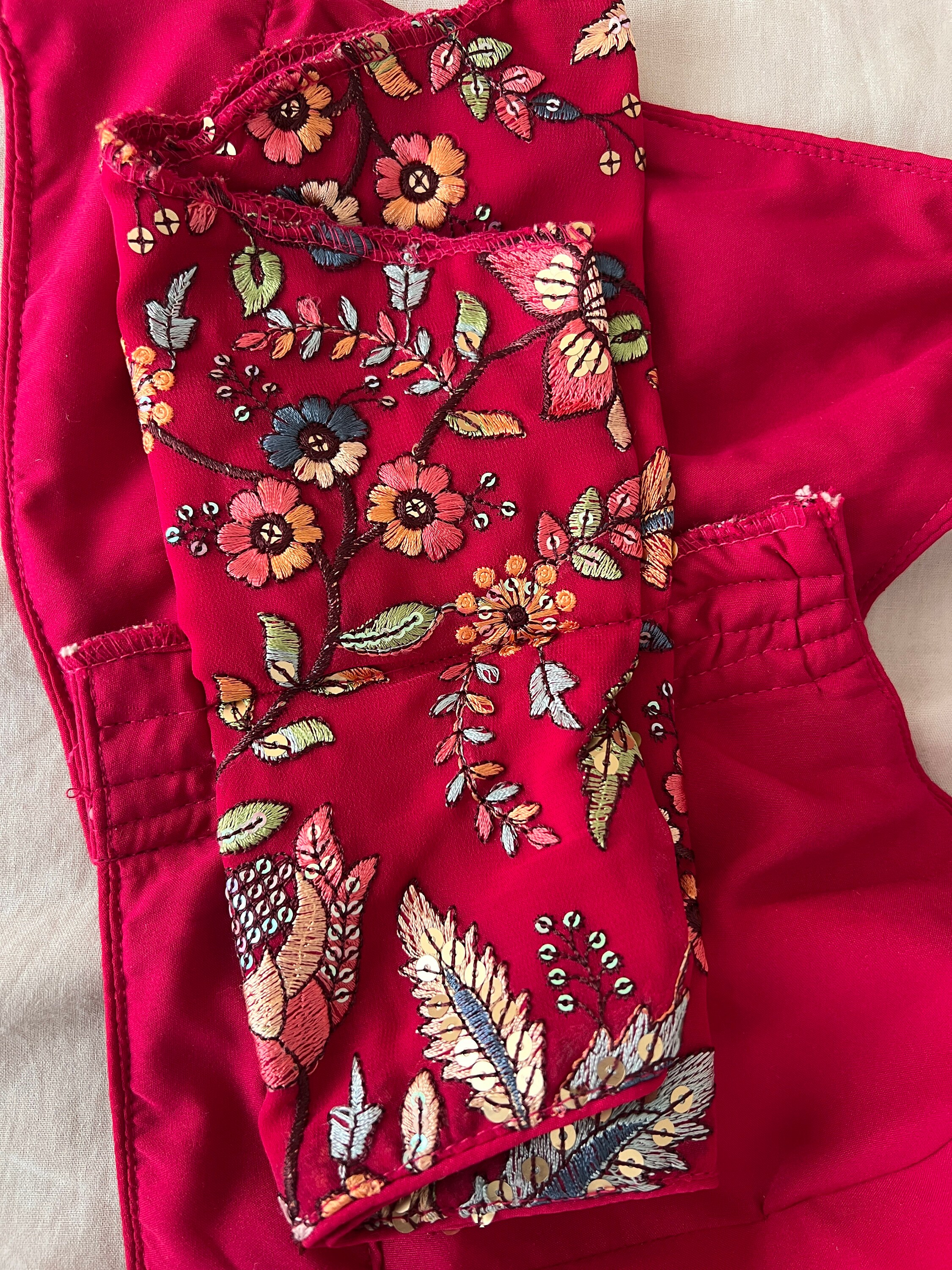Red Sleeveless Blouse with U Neckline