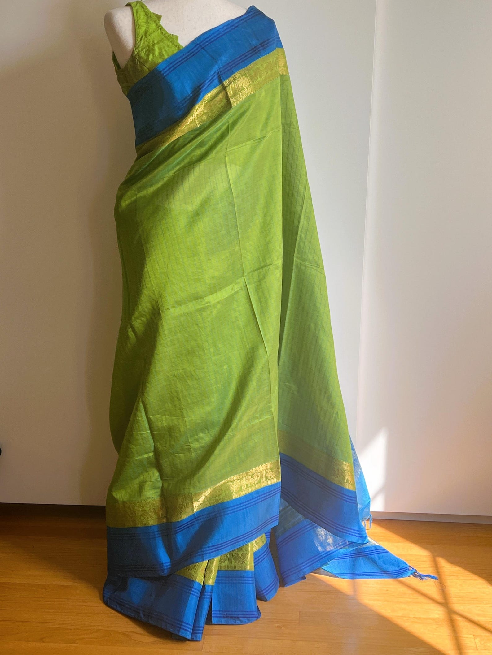 Forest Green Embossed Semi Silk Saree with Floral Design Satin Border and Blouse