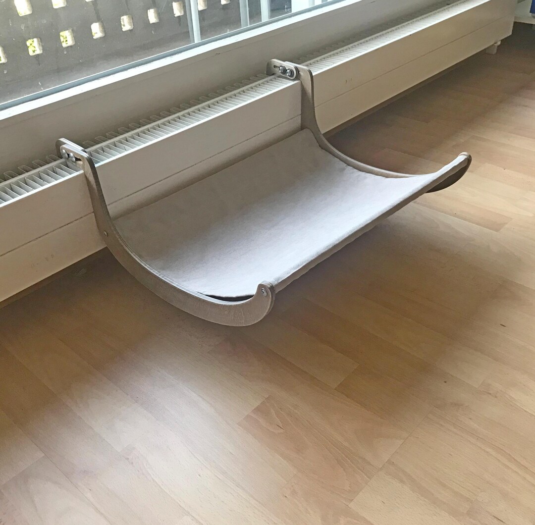 Cat Radiator Hamock A Cat's Bed, a Cat's Hammock, Located on a Low Radiator, on the Edge of ...