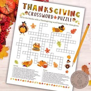 May include: A printable Thanksgiving crossword puzzle with an autumnal theme. The puzzle features a turkey, cornucopia, and autumn leaves. The crossword puzzle has 14 clues across and 12 clues down.