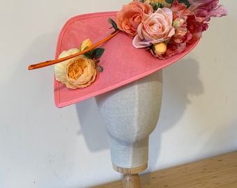 Handcrafted bespoke candy pink and orange ascot / wedding / occasion fascinator hat with tulip, rose and peony details