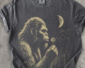 Bigfoot Blowing Dandelion Shirt, Peaceful Sasquatch Tee, Funny Bigfoot Shirt, Woodland Cryptid Shirt, Nature Lover Gift