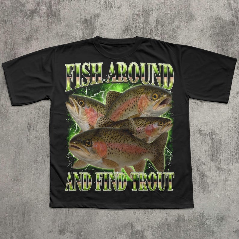May include: Black t-shirt featuring a graphic of four trout with the text "FISH AROUND AND FIND TROUT" in a green and yellow font. The trout are brown, red, and white, with a green lightning-like background.