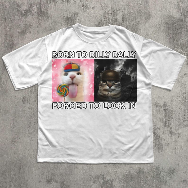May include: White t-shirt with the text "BORN TO DILLY DALLY FORCED TO LOCK IN". The shirt features two cat images: one with a lollipop and the other wearing a helmet.