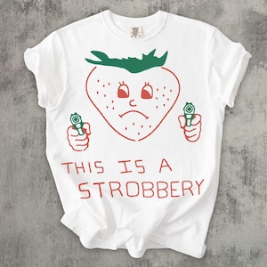 This is Strobbery Funny T-shirt, Retro Strawberry Shirt, Vintage Graphic Tee, Ironic Food Tees , Weird Shirts, Comfort Colors, Unisex Cotton Comfort Color White