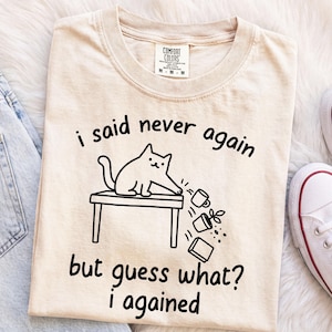 Camiseta "Dije que nunca más, pero adivina qué volví a decir", camiseta divertida de gato, camiseta de gato tirando cosas, regalo para amantes de los gatos