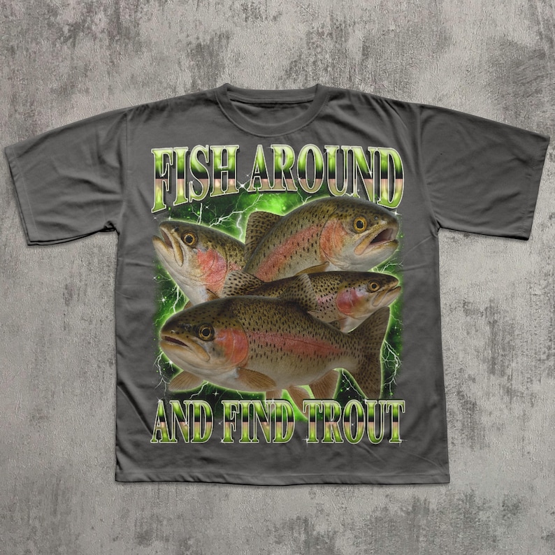 May include: Gray t-shirt featuring a graphic of four trout fish with the text "FISH AROUND AND FIND TROUT" in green and white. The fish have red and brown markings.