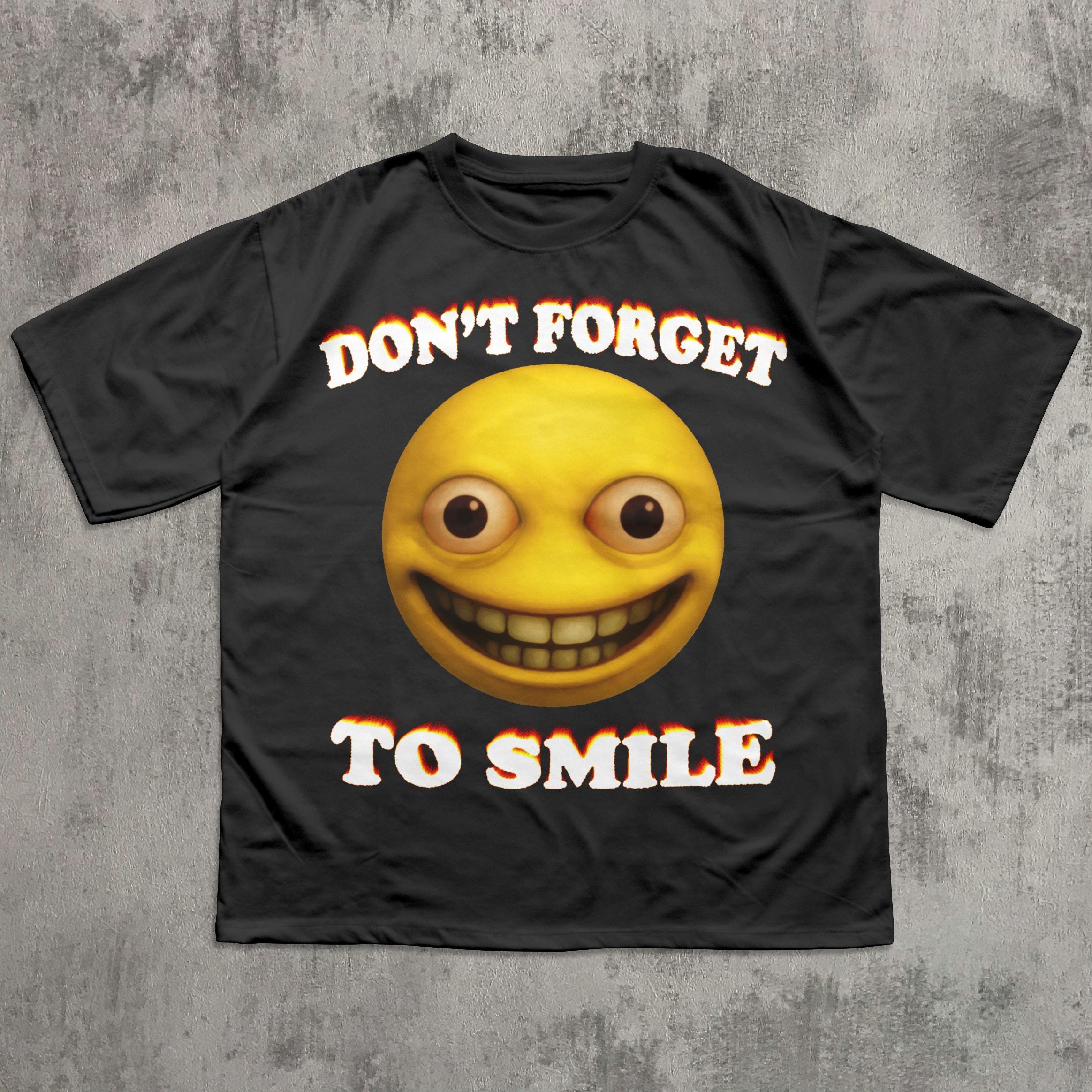 笑顔を忘れないで面白いTシャツ、呪われたスマイリーフェイスのTシャツ