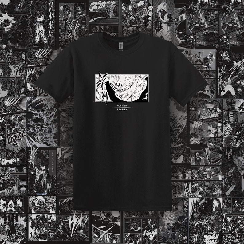 May include: Black t-shirt with a white graphic of a manga character with spiky hair and the text "MAJIK VEGETA" and "成人ヘジーチ".