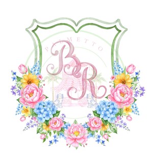 May include: A watercolour design featuring a floral wreath around a shield-shaped emblem. The emblem displays the letters "BR" in pink script, with a light pink pagoda in the background. The wreath includes pink peonies, blue hydrangeas, and yellow flowers.