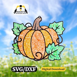 May include: A digital graphic of a pumpkin with a textured orange surface, a brown stem, and green leaves with a textured finish. The design features black outlines and includes the text DUCK'S DESIGN DEN, SVG/DXF, and Digital Download.