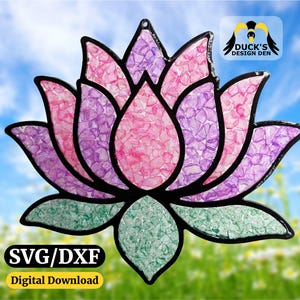 May include: A colorful lotus flower design with pink, purple, and green accents. The image includes the text "SVG/DXF Digital Download" and the logo "Duck's Design Den". The design is suitable for laser-ready files.
