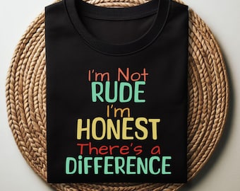May include: Black t-shirt with the text "I'm Not Rude I'm Honest There's a Difference" in colourful letters.