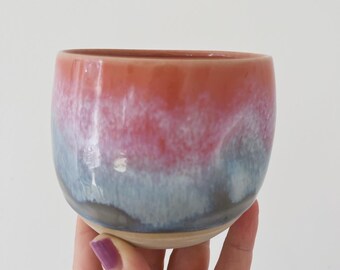 Ceramic mug with thumb recess