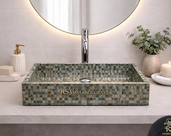 May include: A rectangular mosaic tile sink with a chrome faucet. The sink is made of small, square tiles in shades of green, brown, and gray. The text "RSV MARBLE CRAFTS" is visible on the front of the sink.