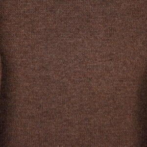 Peut inclure: Gros plan sur un tissu tricot&eacute; marron. La texture est visible, r&eacute;v&eacute;lant les fils individuels et le motif de tissage. La couleur est un marron chaud et terreux, avec de subtiles variations de tons. Le tissu semble doux, peut-&ecirc;tre en laine ou similaire.