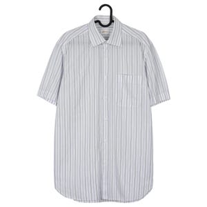 May include: A short-sleeved, button-down shirt with vertical stripes of light blue and white. The shirt has a chest pocket on the left side and is hanging on a black hanger. The collar is a classic style.
