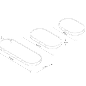 May include: Line drawing of three oval-shaped shelves with dimensions. The largest shelf is 33 cm long and 12 cm wide. The middle shelf is 23 cm long. The smallest shelf is 18 cm long. The shelf thickness is 24 mm.