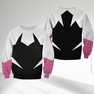 May include: A white and black sweatshirt with a spider-web design. The sleeves are pink with a web pattern. The back of the sweatshirt is also white and black with a spider-web design. The sweatshirt is made of a soft material.