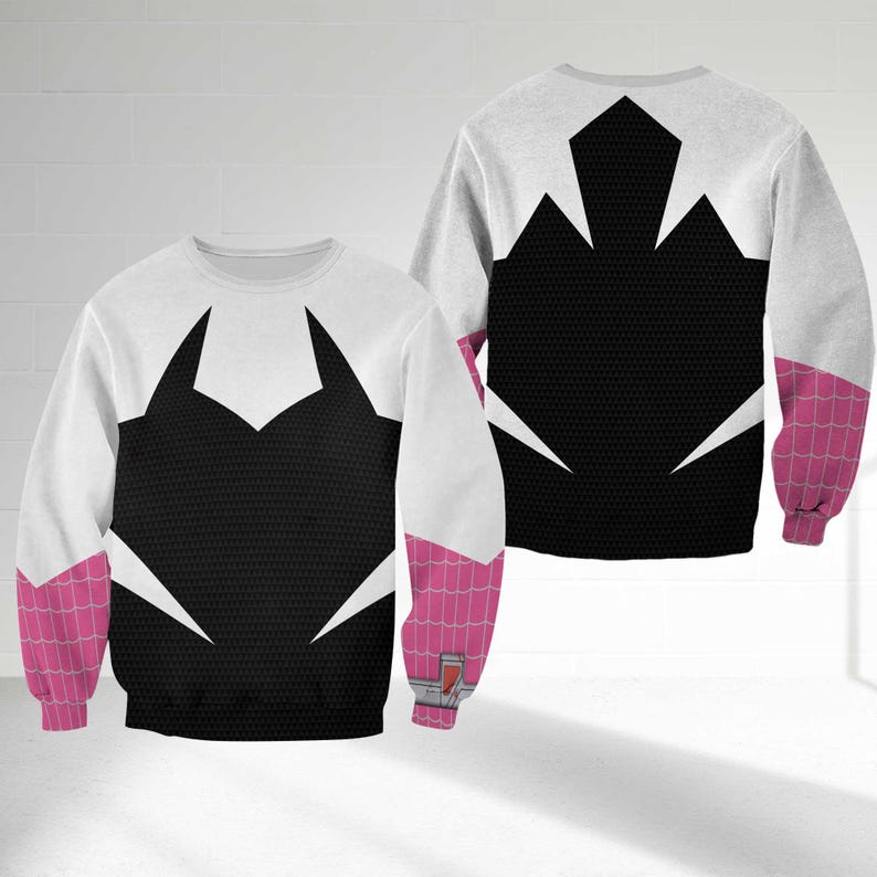 May include: A white and black sweatshirt with a spider-web design. The sleeves are pink with a web pattern. The back of the sweatshirt is also white and black with a spider-web design. The sweatshirt is made of a soft material.