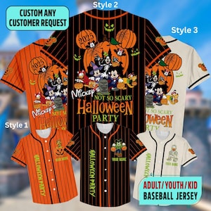 May include: Several baseball jerseys with Halloween-themed designs. Styles include orange and black striped jerseys with pumpkin and character graphics. The text includes "Mickey's Not So Scary Halloween Party" and "Halloween Party". The jerseys are available in adult, youth, and kid sizes.