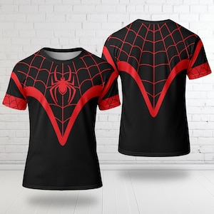 May include: Black t-shirt with a red spiderweb design and a red spider emblem on the front. The shirt has a crew neck and short sleeves. The back of the shirt also features a red spiderweb design.