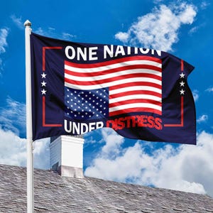 May include: A flag featuring the American flag design with the text "ONE NATION" above and "UNDER DISTRESS" below. The flag has a blue border with white stars and is displayed against a blue sky.