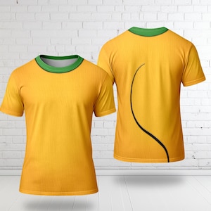 May include: Two yellow t-shirts with short sleeves and a green collar. One shirt is viewed from the front, the other from the back, with a black curved design element. The shirts are displayed against a white brick wall.