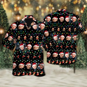 May include: Black button-up shirt with a festive Christmas design. The shirt features faces wearing Santa hats, string lights, snowflakes, gingerbread men, and candy canes. A fun and unique holiday apparel item.